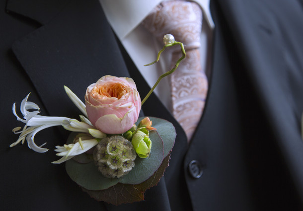 Herencorsage 'Roos met een twist'