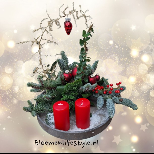 Kerststuk met kaarsen